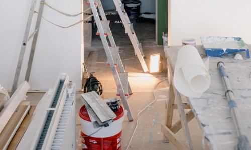 A room full of contractor supplies, mid renovation.