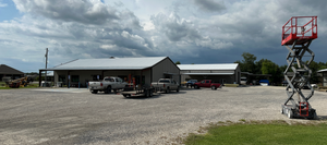 JW Hardware & Lumber store front on a cloudy day.